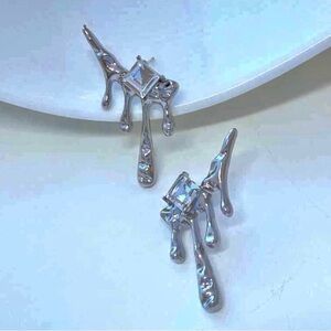 New silver dripping earrings